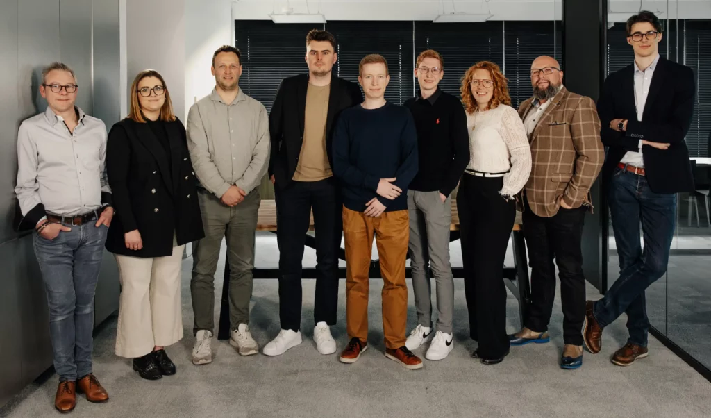 Foto van het Com-One team